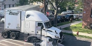 truck making tight turn on residential street pt 3