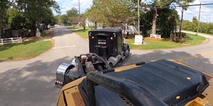 Kenworth hauling excavator in the county roads 